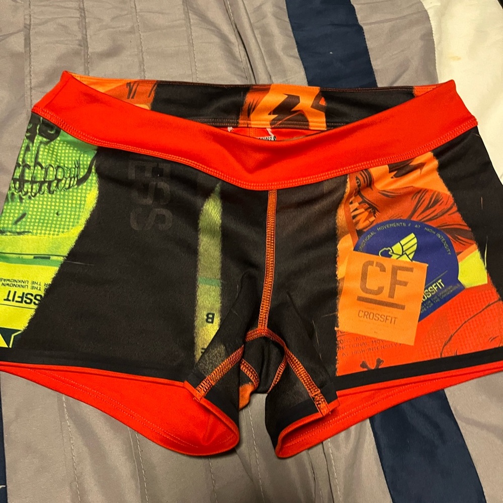 4 pair of shorts. Reebok, savage barbell, rogue, salty savage